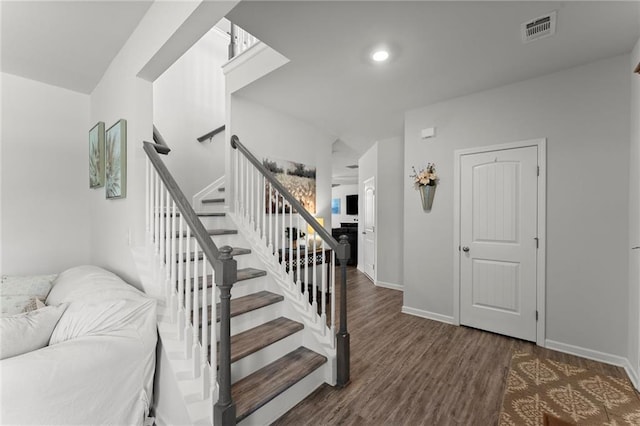34 Hemlock Gln, Dallas, GA 30132 - stairway featuring wood finished floors, baseboards, and recessed lighting