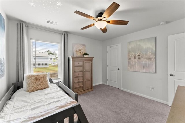 34 Hemlock Gln, Dallas, GA 30132 - bedroom featuring light colored carpet, baseboards, and a ceiling fan