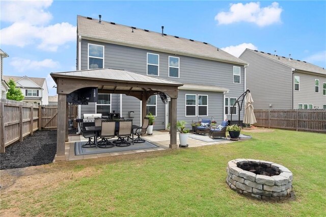 34 Hemlock Gln, Dallas, GA 30132 - back of property featuring a gazebo and a patio area
