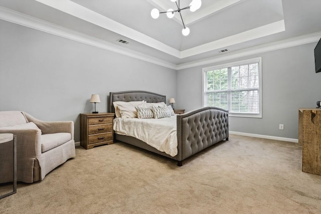 bedroom with baseboards, visible vents, a tray ceiling, ornamental molding, and light carpet