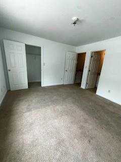3609 Ginnis Rd, Atlanta, GA 30331 - unfurnished bedroom featuring multiple closets