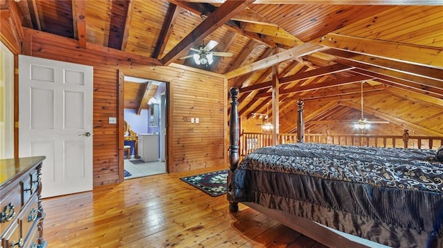 bedroom featuring vaulted ceiling with beams, light hardwood / wood-style flooring, wooden walls, and wood ceiling