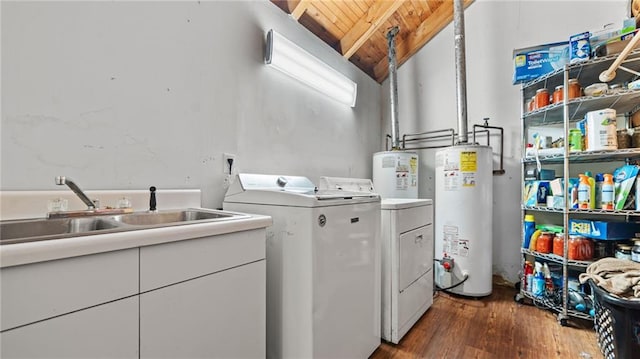 washroom featuring dark wood-type flooring, sink, washer and dryer, water heater, and wood ceiling