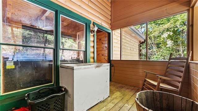 sunroom / solarium with plenty of natural light