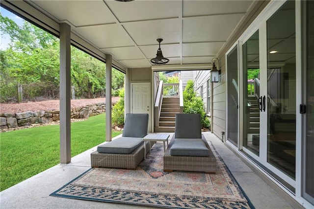 view of patio / terrace featuring stairway