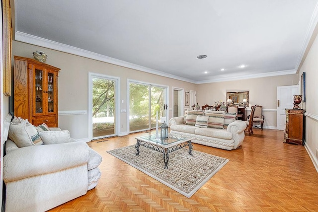 living room featuring light parquet flooring and crown molding