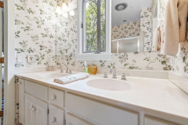 bathroom with dual vanity