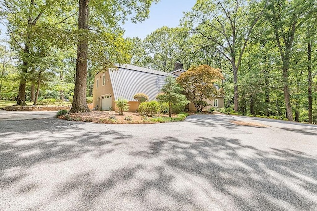 view of home's exterior featuring a garage