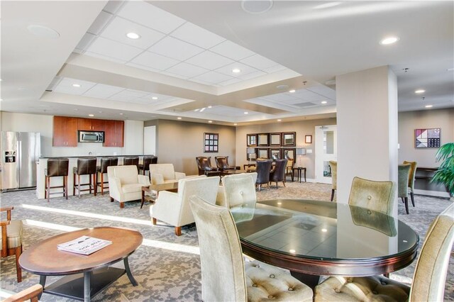 view of carpeted dining space