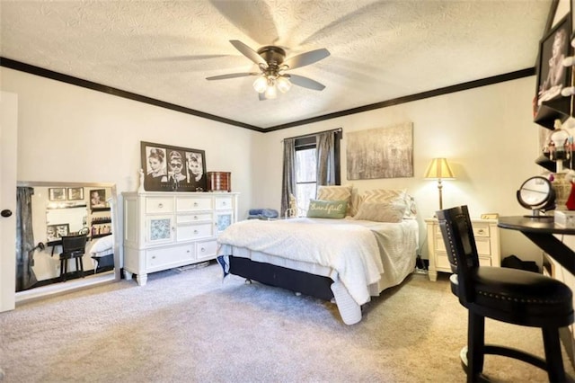 carpeted bedroom featuring crown molding, ceiling fan, and a textured ceiling