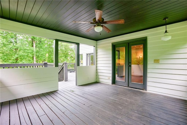 exterior space with ceiling fan, french doors, and wood ceiling