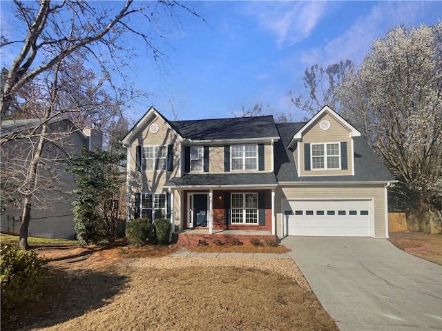 view of front facade featuring a garage, driveway, and brick siding