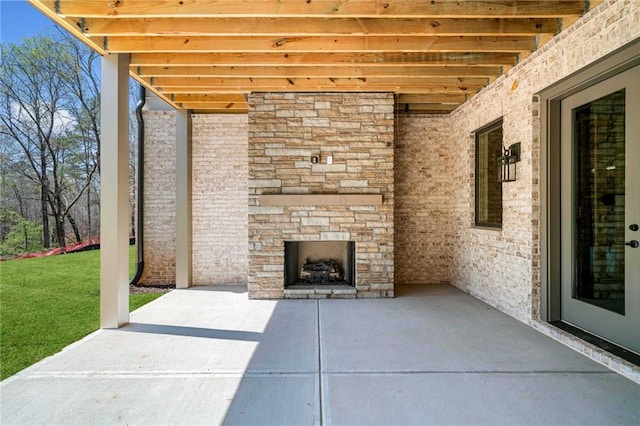 605 Claxton Ln, Milton, GA 30004 - view of patio featuring an outdoor stone fireplace
