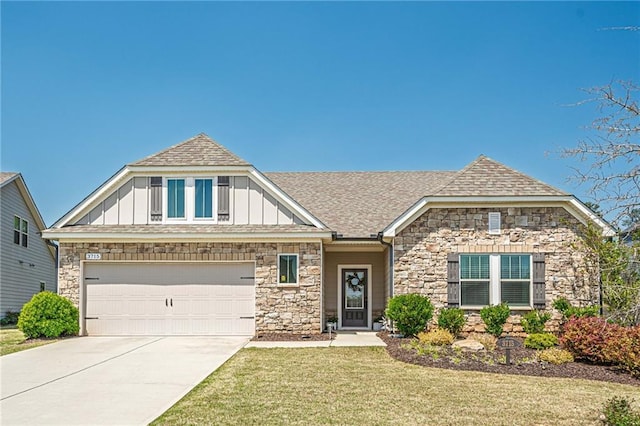 3715 Bridges Ct, Cumming, GA 30040 - view of front facade with stone siding, board and batten siding, concrete driveway, and a front yard