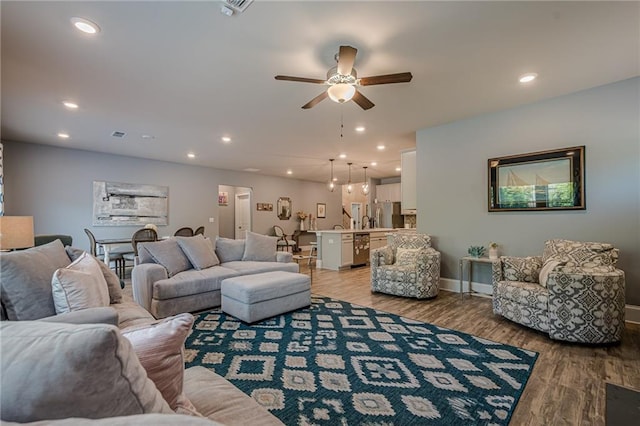 3715 Bridges Ct, Cumming, GA 30040 - living area featuring a ceiling fan, light wood-style floors, baseboards, and recessed lighting