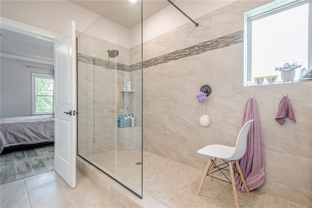 3715 Bridges Ct, Cumming, GA 30040 - bathroom featuring walk in shower, ensuite bathroom, and tile patterned flooring