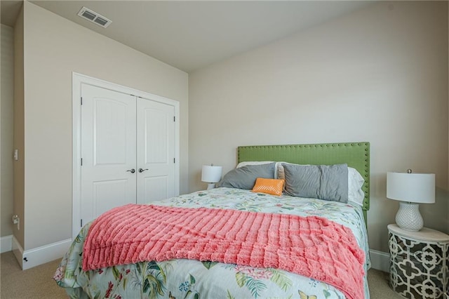 3715 Bridges Ct, Cumming, GA 30040 - carpeted bedroom featuring baseboards and a closet