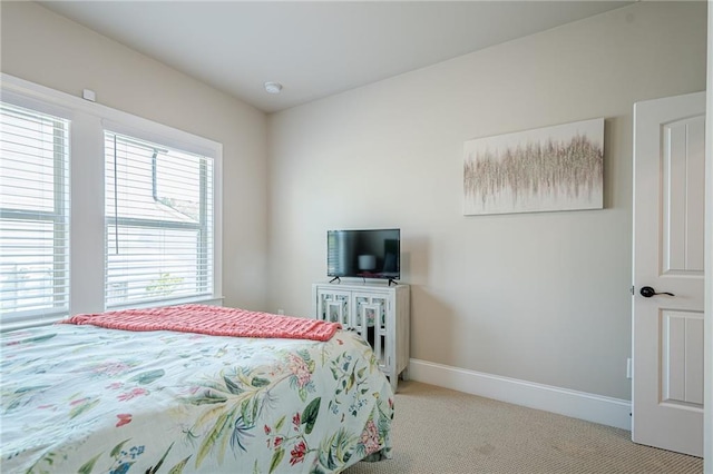 3715 Bridges Ct, Cumming, GA 30040 - bedroom with light carpet and baseboards