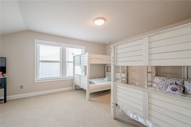 3715 Bridges Ct, Cumming, GA 30040 - bedroom featuring lofted ceiling, carpet floors, and baseboards
