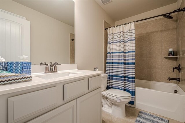 3715 Bridges Ct, Cumming, GA 30040 - full bath featuring toilet, vanity, shower / bath combo, and tile patterned floors