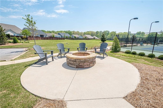 3715 Bridges Ct, Cumming, GA 30040 - view of patio with an outdoor fire pit and a tennis court