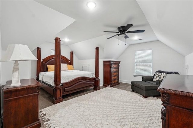 bedroom with wood finished floors, baseboards, visible vents, ceiling fan, and vaulted ceiling