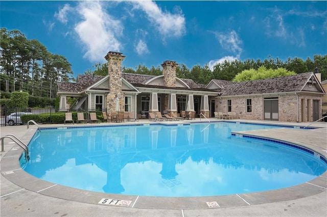 view of pool featuring a patio