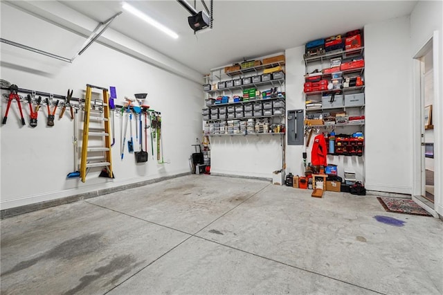garage featuring a garage door opener and electric panel