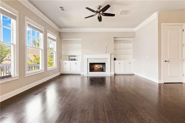 unfurnished living room featuring visible vents, wood finished floors, built in shelves, and ceiling fan
