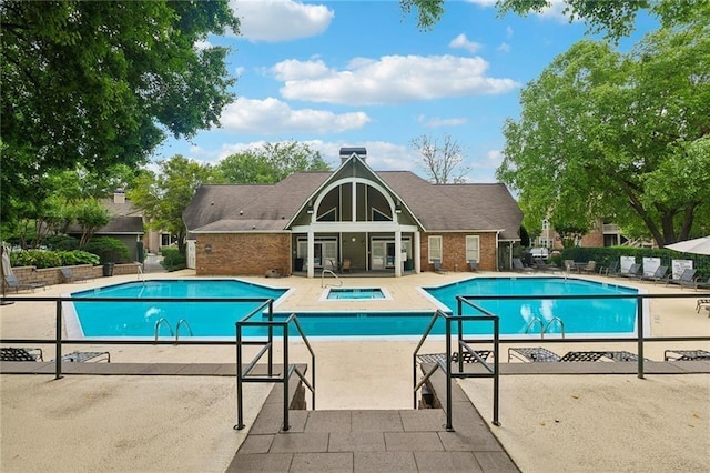539 Mcgill Park Ave NE, Atlanta, GA 30312 - community pool featuring a patio and a hot tub