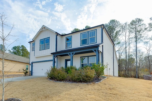 view of front facade with a garage and a front lawn