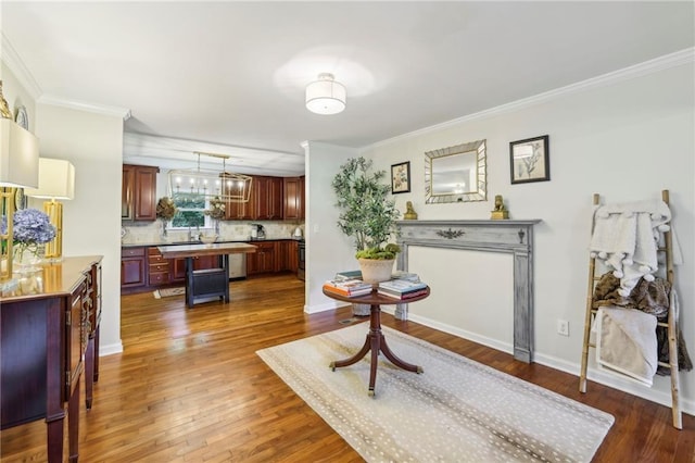 1600 Belle Isle Cir NE, Atlanta, GA 30329 - living room featuring crown molding, dark wood finished floors, and a chandelier