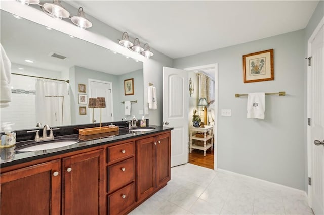 1600 Belle Isle Cir NE, Atlanta, GA 30329 - bathroom featuring double vanity and curtained shower