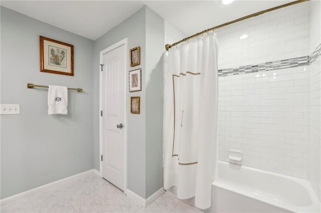 1600 Belle Isle Cir NE, Atlanta, GA 30329 - bathroom with shower / bath combination with curtain and marble look tiles