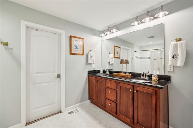 1600 Belle Isle Cir NE, Atlanta, GA 30329 - bathroom with double vanity and a shower with curtain