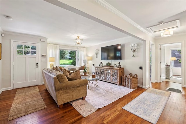 1600 Belle Isle Cir NE, Atlanta, GA 30329 - living area featuring hardwood / wood-style floors, ornamental molding, and attic access
