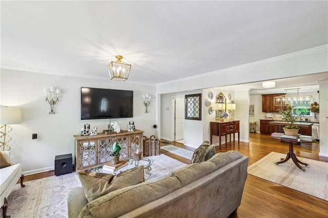 1600 Belle Isle Cir NE, Atlanta, GA 30329 - living area with a chandelier, crown molding, and wood finished floors