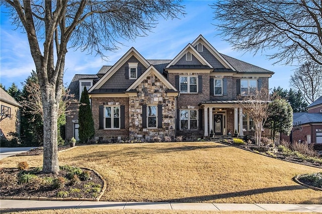 craftsman house with a front yard