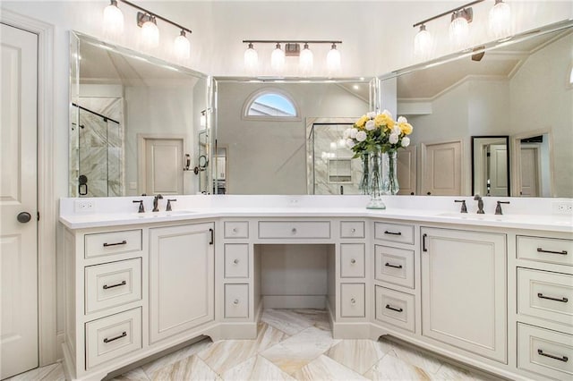 bathroom featuring a shower with shower door, lofted ceiling, and vanity