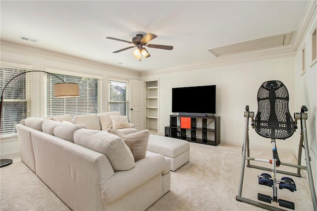 living room featuring light carpet, ceiling fan, and crown molding