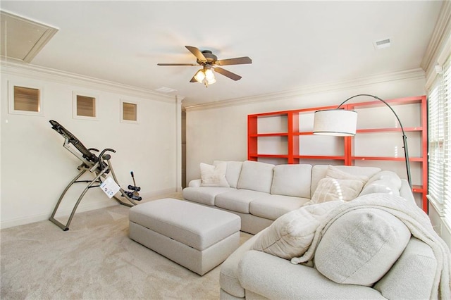 carpeted bedroom featuring ceiling fan and ornamental molding