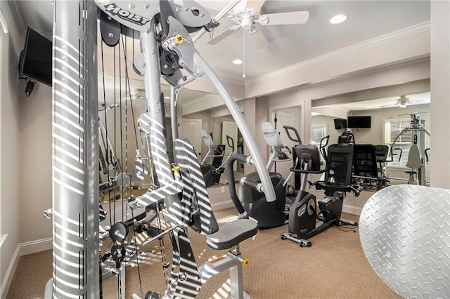 exercise room with carpet flooring, ceiling fan, and crown molding