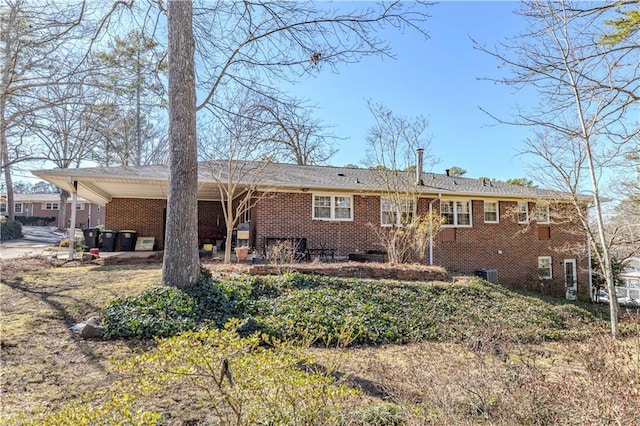 view of front of property featuring brick siding