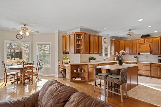 2287 Lake Ridge Ter, Lawrenceville, GA 30043 - kitchen featuring open shelves, ceiling fan, custom exhaust hood, black electric cooktop, and ornamental molding