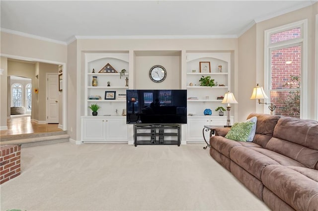 2287 Lake Ridge Ter, Lawrenceville, GA 30043 - living room with ornamental molding, built in shelves, light colored carpet, and arched walkways