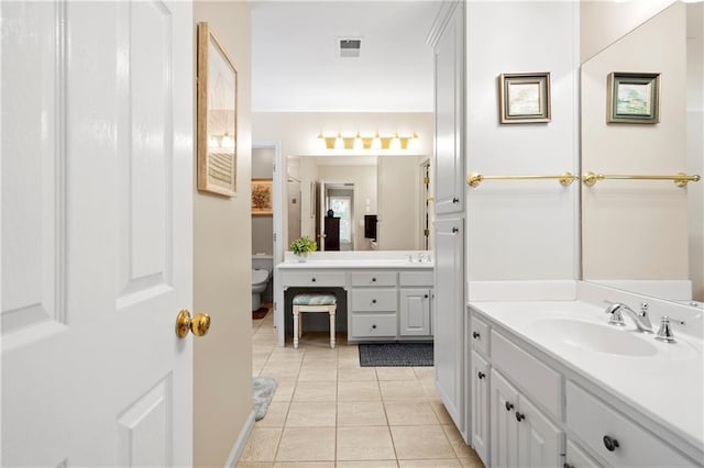 2287 Lake Ridge Ter, Lawrenceville, GA 30043 - bathroom featuring vanity and tile patterned flooring