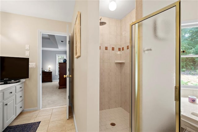 2287 Lake Ridge Ter, Lawrenceville, GA 30043 - bathroom featuring a shower stall, tile patterned flooring, and vanity