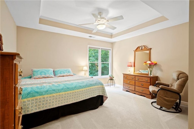 2287 Lake Ridge Ter, Lawrenceville, GA 30043 - bedroom with a raised ceiling, ceiling fan, and carpet floors