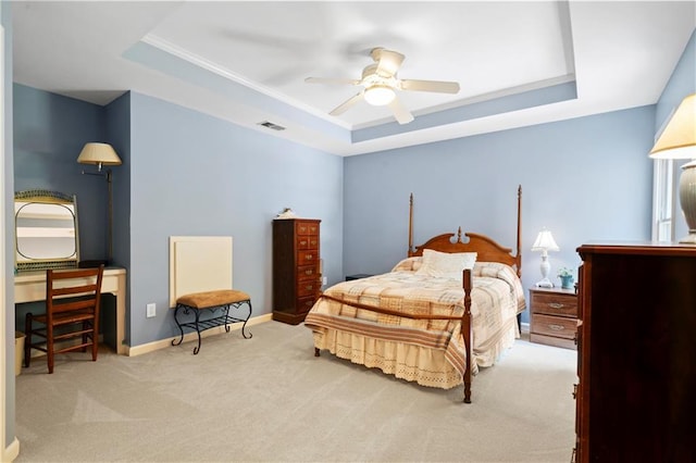 2287 Lake Ridge Ter, Lawrenceville, GA 30043 - carpeted bedroom with a raised ceiling, crown molding, and a ceiling fan