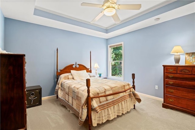 2287 Lake Ridge Ter, Lawrenceville, GA 30043 - bedroom featuring carpet flooring, a ceiling fan, and a tray ceiling